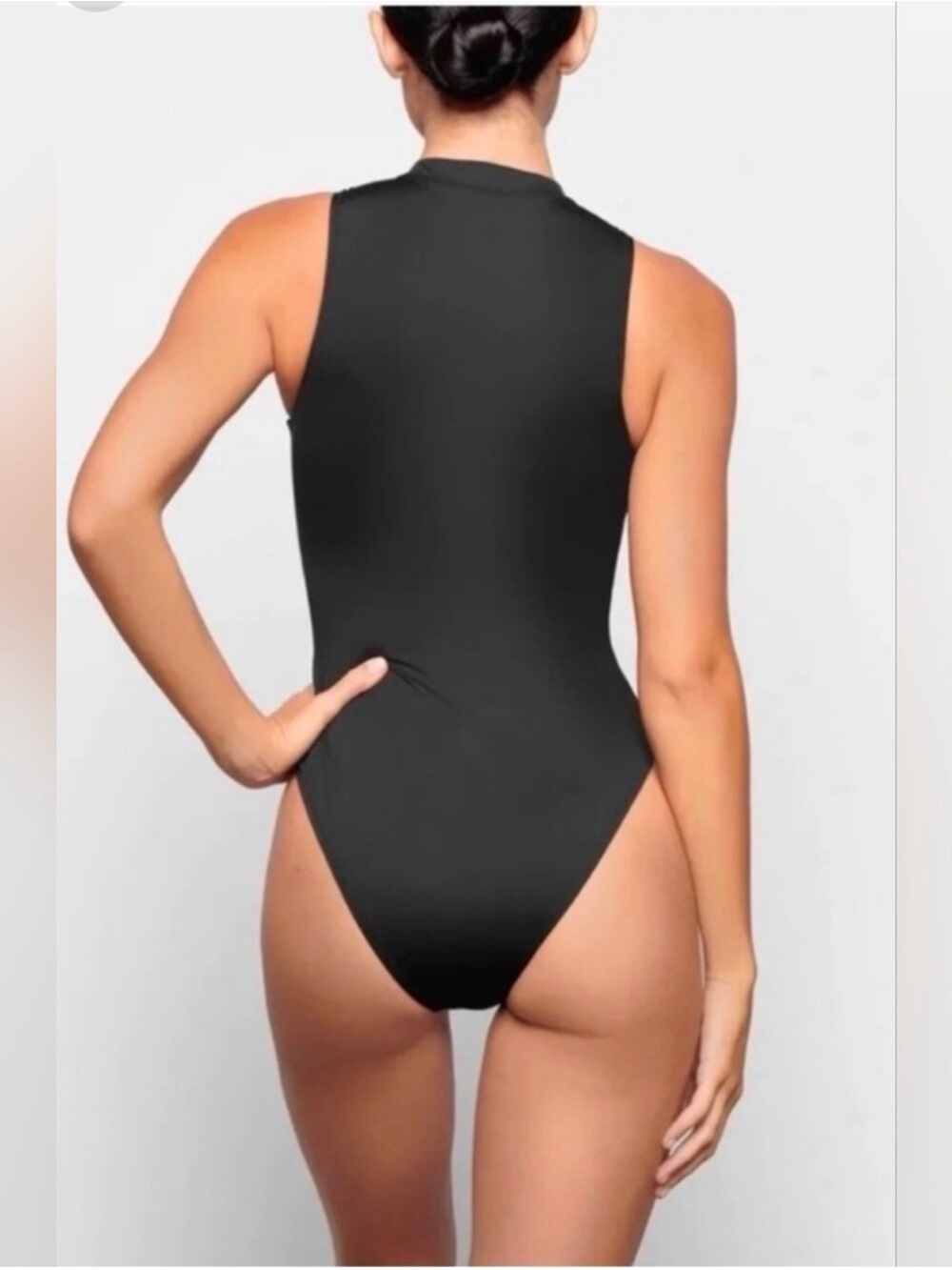 SKIMS Sleeveless Black Zip-Front Swimsuit in Color Onyx - Picture 2 of 11